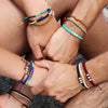 White Chasqui Sweet Caramel bracelets that help children lifestyle