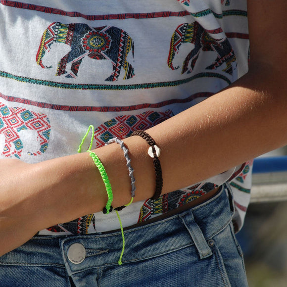 Black Raymi Bright Green bracelets that fight poverty cover