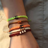 Brown Cuzco Sweet Caramel bolivian bracelets on wrist