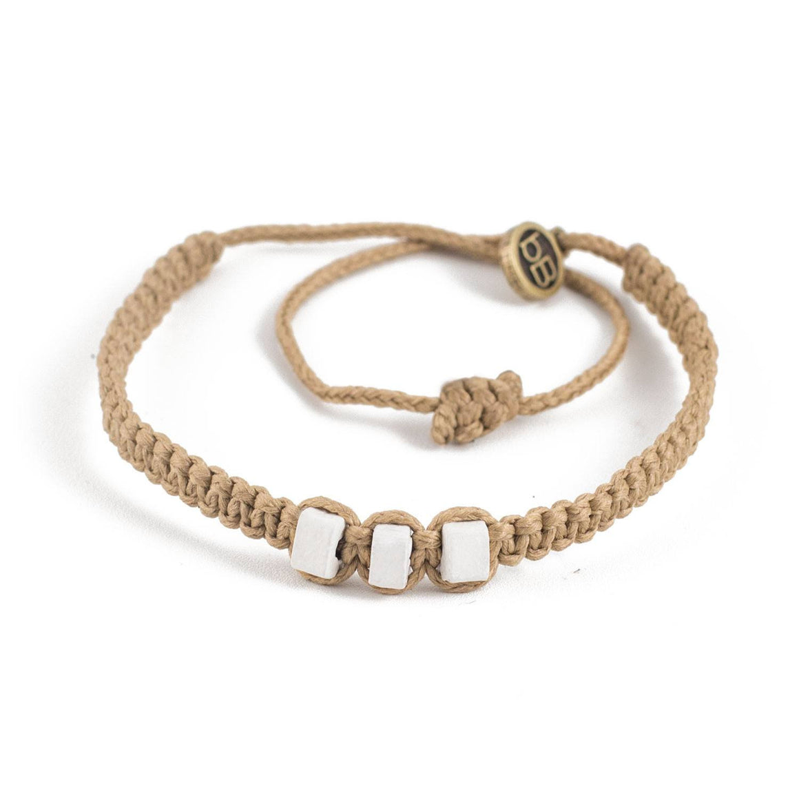 White Chasqui Arabic Camel bracelets that help children cover