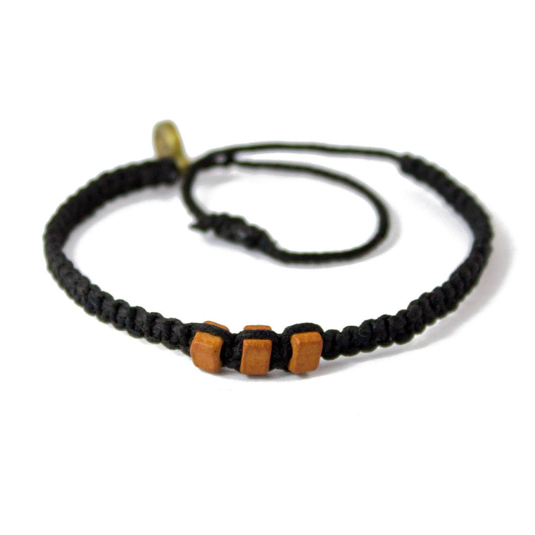 Brown Chasqui Carbon Black bracelets that help children cover