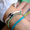 Andel Bright Cyan Knotted Charity Bracelet On Wrist