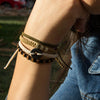 Brown Andes Carbon Black macrame artisan bracelets on wrist