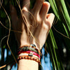 Brown Andes Chocolate Brown macrame artisan bracelets on wrist