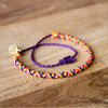 Carnival Russian Purple Bracelets With A Cause on wood