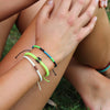 T'hiti Licorice Black beach bracelets on wrist
