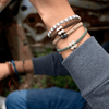 White Andes Stone Grey macrame artisan bracelets on wrist