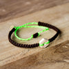 White Rustic Bright Green handmade ethnic bracelets on wood