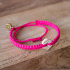 White Rustic Candy Pink handmade ethnic bracelets on wood